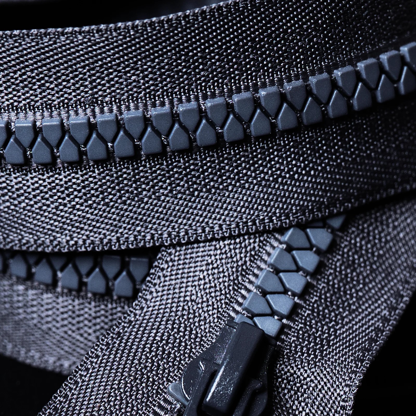 Close-up of a black moulded zipper